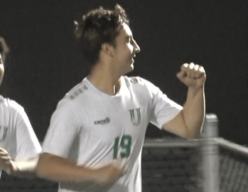 Decatur Pioneers high school soccer team celebrating a second-half victory